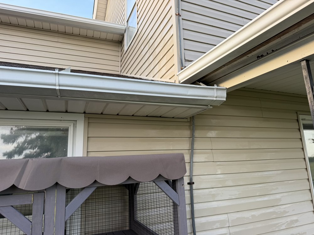 Clean white gutters after professional gutter cleaning
