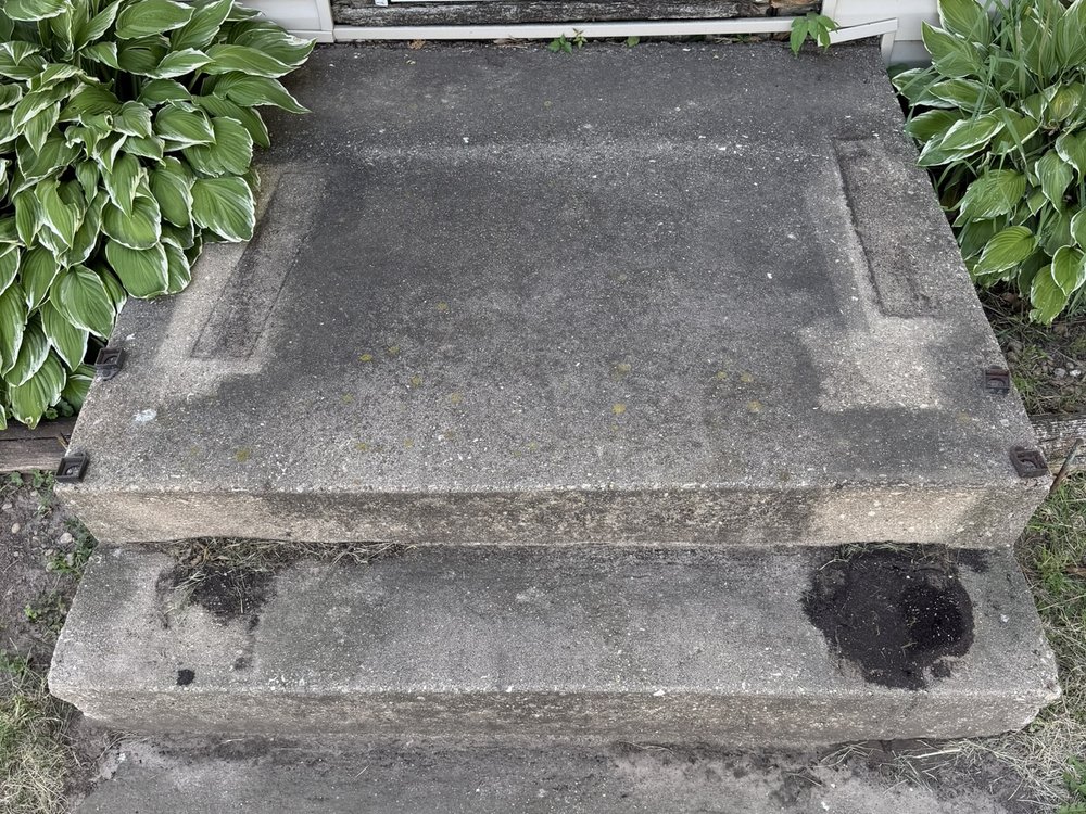 Stained concrete steps before restoration